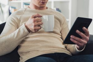 man holding ebook